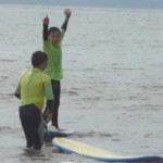 Beginners learn to surf with Cressey’s Surf Academy