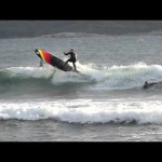 LONGBOARD SURFING WITH PADDLE