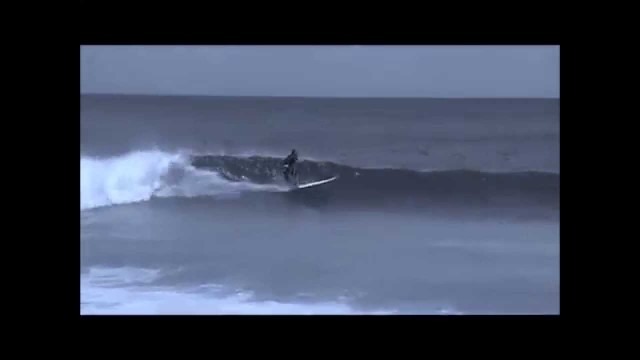 Crocket surfing maldives longboard style